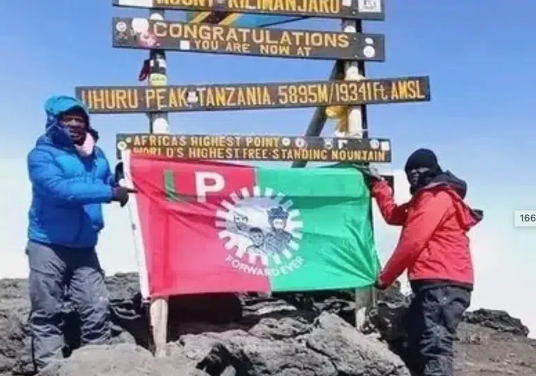 Man Hoist Labour Party’s Flag On Africa’s Highest Mountain, Kilimanjaro (Photo)