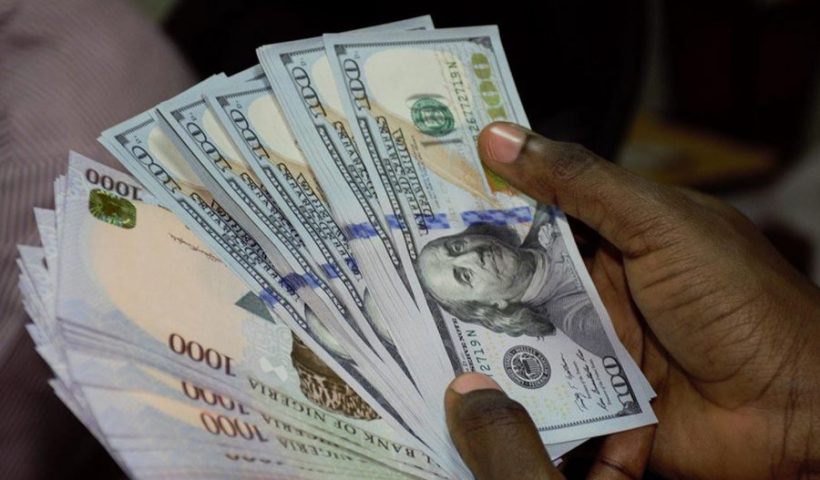 Industrialists and Parents Express Concern as Naira Closes 2023 at 907/$