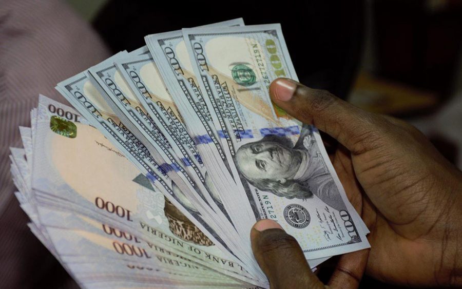 Industrialists and Parents Express Concern as Naira Closes 2023 at 907/$